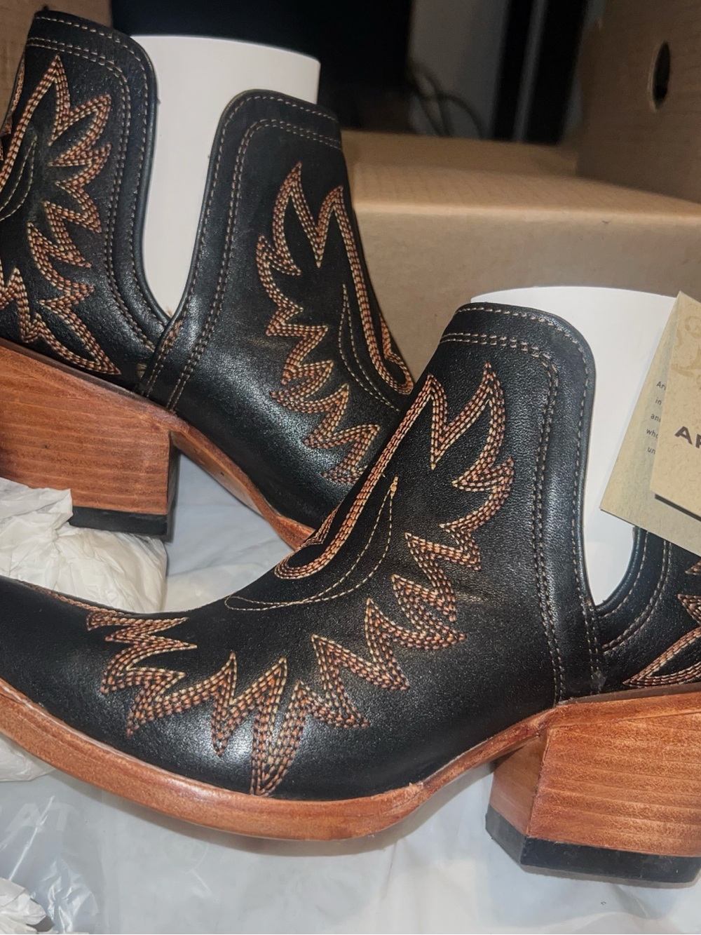 Never worn. Brand new with tag. Size 8 Ariat Women's Dixon Western Booties